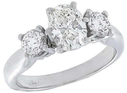 Oval and Round Cut Diamond 14k White Gold Anniversary Ring