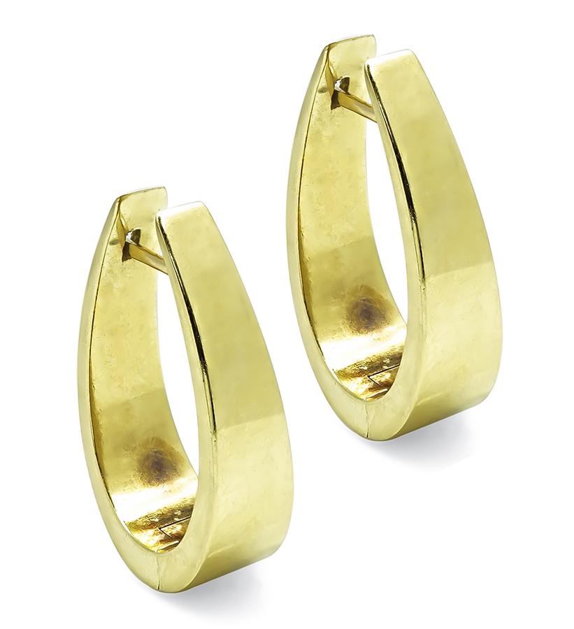 Estate Cartier 18K yellow gold earrings with sleek elongated design