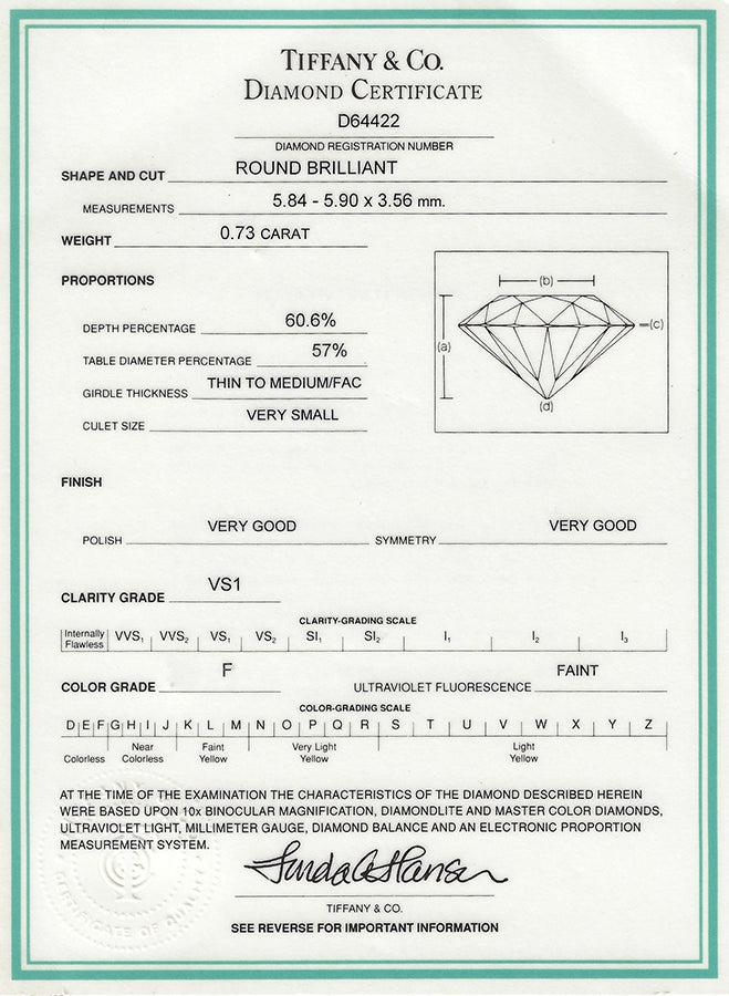 Estate Tiffany & Co 0.73ct Diamond Solitaire Engagement Ring and Band Set