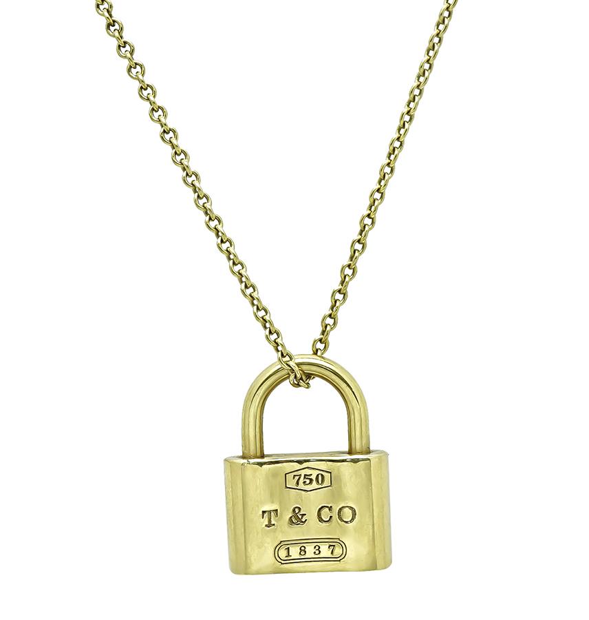 Estate Tiffany & Co 18K yellow gold lock pendant necklace signed 750