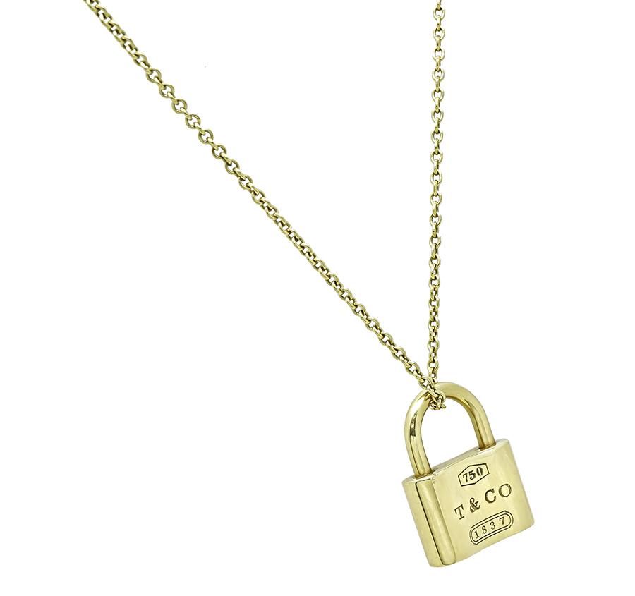 Tiffany & Co estate 18K yellow gold lock charm necklace classic design