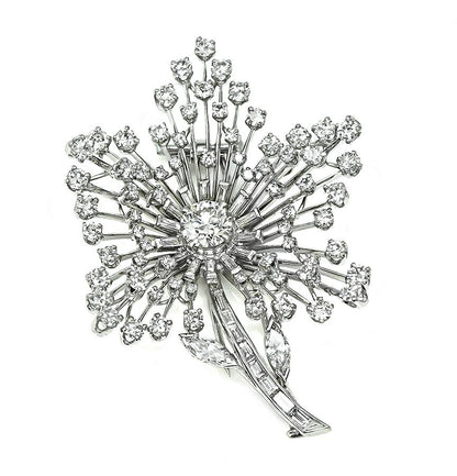 Vintage 6.25cttw diamond flower pin in platinum with Old European cut center