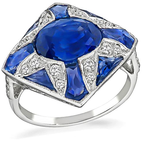 Oval and Faceted Cut Sapphire Round Cut Diamond 18k Gold Ring