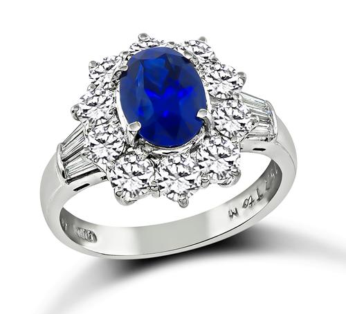 Oval Cut Sapphire Round and Baguette Cut Diamond Platinum Engagement Ring