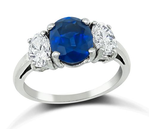 Oval Cut Sapphire and Diamond Platinum Engagement Ring