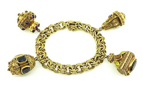 4 Pieces Novelty 18k and 14k Yellow Gold Charm Bracelet
