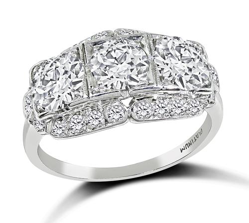 Old Mine Cut Diamond Platinum Three Stone Ring