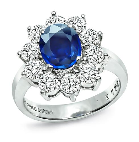 Oval Cut Sapphire Round Cut Diamond Platinum and 18k Gold Engagement Ring