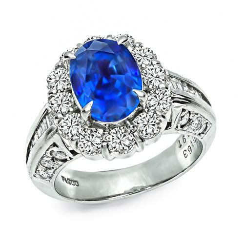 Oval Cut Sapphire Round and Baguette Cut Diamond Platinum Ring