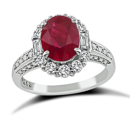 Oval Cut Ruby Round and Baguette Cut Diamond Platinum Engagement Ring