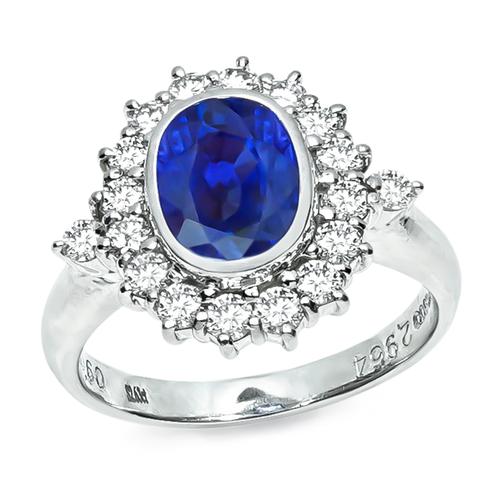 Oval Cut Sapphire Round Cut Diamond Platinum Ring