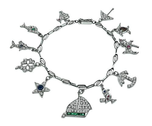 Round Cut Diamond Sapphire Ruby Emerald and Garnet Platinum Charm Bracelet