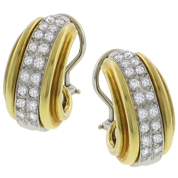  pair of diamond  14 white gold earrings and 14k yellow gold sleeve 1
