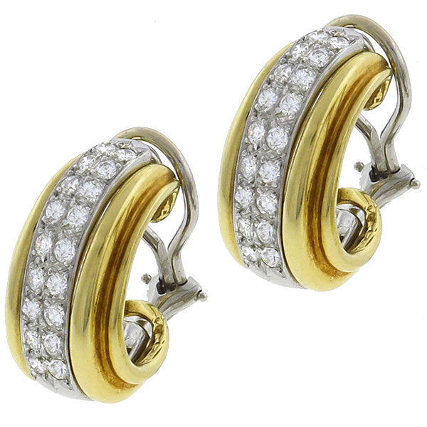  pair of diamond  14 white gold earrings and 14k yellow gold sleeve 1