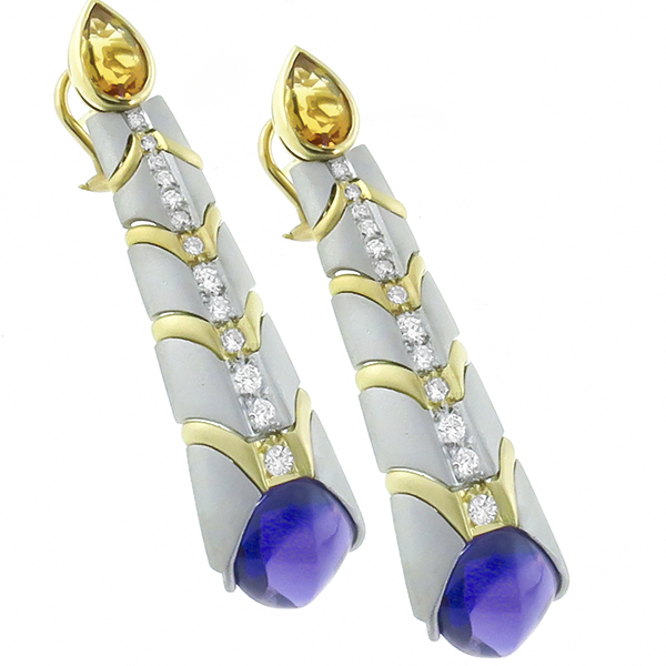 pair of platinum 18k yellow gold earrings 1
