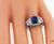 Cushion Cut Sapphire Trapezoid and Round Cut Diamond Platinum Ring